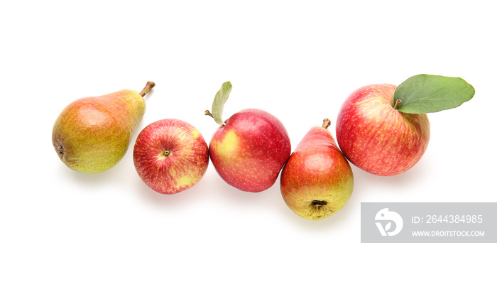 Ripe pears and apples on white background