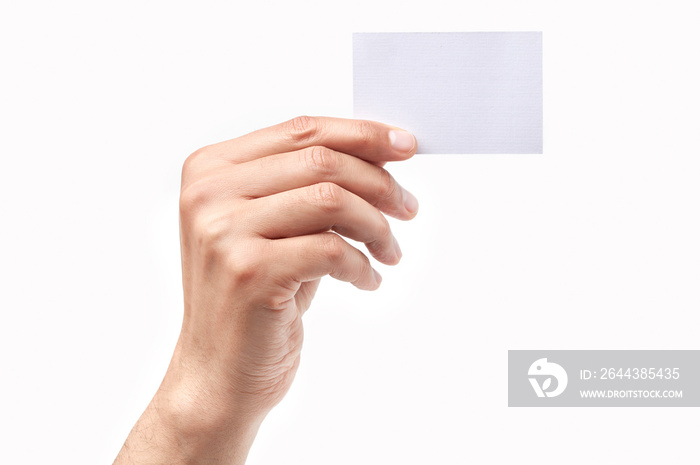 hand holding a blank card isolated