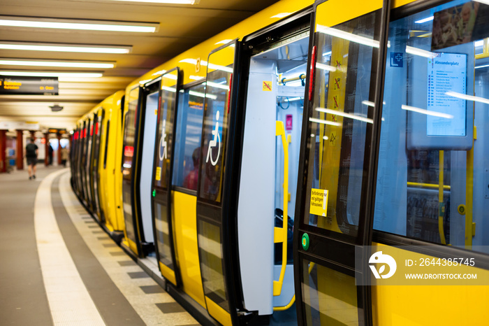 Modern subway. Yellow train at the station