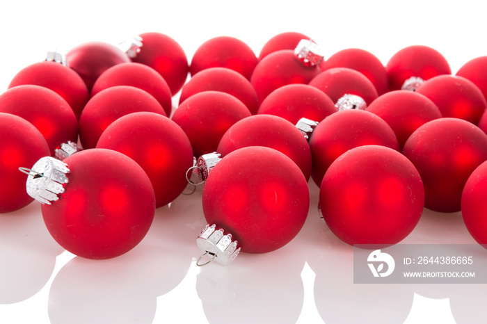 Red Christmas balls isolated at a white background