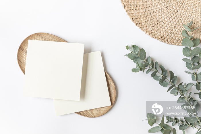 Styled summer wedding desktop stationery mockup. Blank greeting and invitation card. Green tropical leaves with empty space.