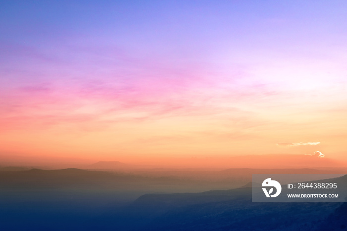 Mountain and sky sunset background. Mak Duk cliff, Phu Kradueng National Park, Loei, Thailand