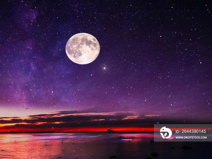 full moon on night starry sky at sea lilac pink sunset sky stars summer sea dark blue water reflection moonlight galaxy background nature