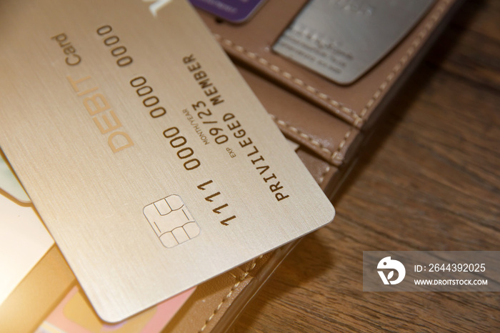 Many credit cards or debit cards on wooden,master card