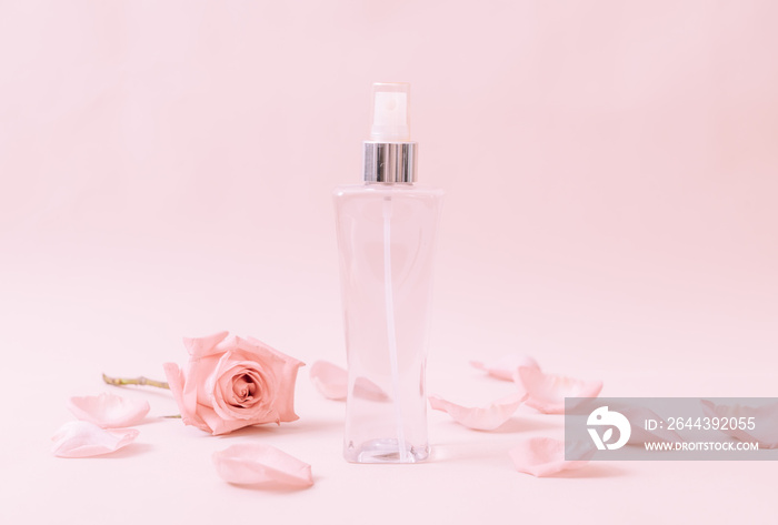 perfume bottle with rose petal