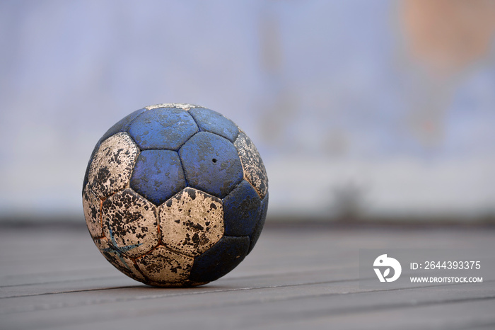 Handball ball on an old floor