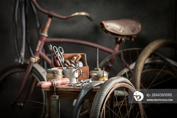 Vintage bicycle repair workshop with spare parts. Vulcanization workshop