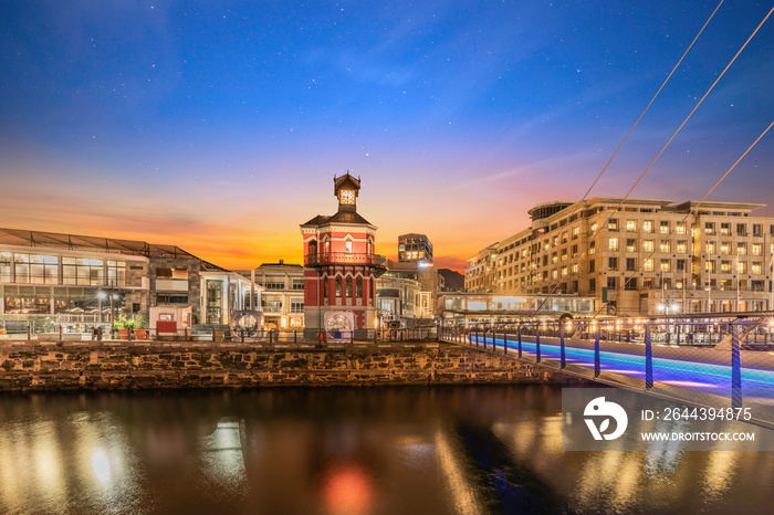 Clock tower at night in waterfront cape town South Africa