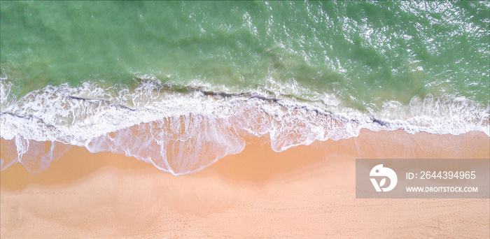 Aerial view of tropical sandy beach and ocean. Copy space