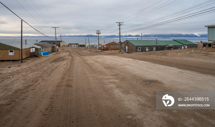 Streetscape of houses overlooking the Arctic Ocean at Pond Inlet (Mittimatalik), Nunavut