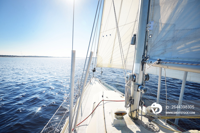 View from the bow of a yacht as the vawes are sparkling