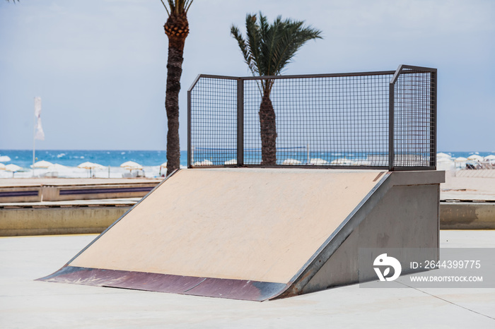 Empty skate park ramp outdoor in seaside beach