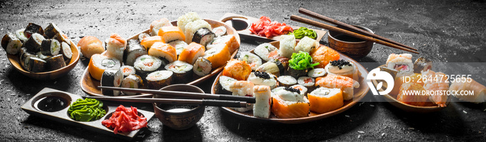 Set of traditional Japanese food sushi with soy sauce and ginger.