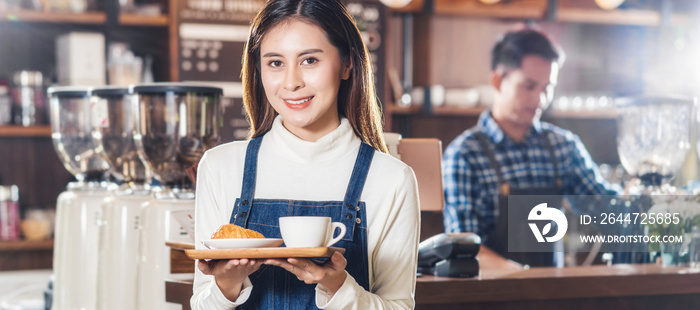 Banner of Asian Coffee shop owner serving bakery cake and coffee cup to customer in coffee shop, Small business owner and startup in coffee shop and restauran, waitress and barista concept