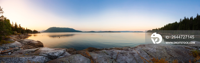 Panoramic View of Mermaid Cove during a colorful summer sunrise. Taken in Saltery Bay, Sunshine Coast, British Columbia, Canada.