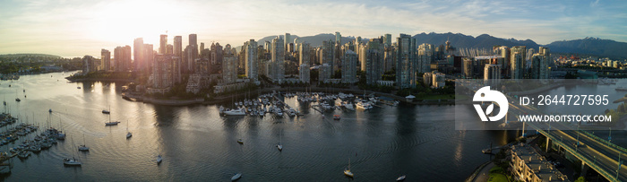 Aerial Panoramic Downtown City Skyline of Vancouver, British Columbia, Canada. Taken during bright sunny sunset.