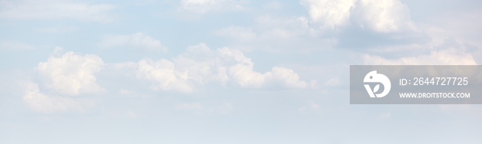 Blue sky background with cumulus clouds