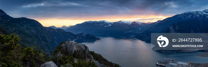 Scenic Panoramic Landscape view of the Beautiful Canadian Nature from the top of the Mountain during  a colorful sunset. Taken in Squamish, North of Vancouver, BC, Canada.