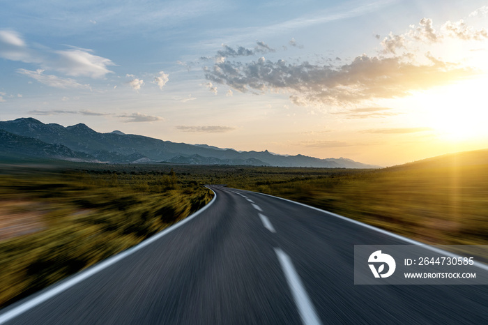 Scenic road. The road is surrounded by a magnificent natural landscape.