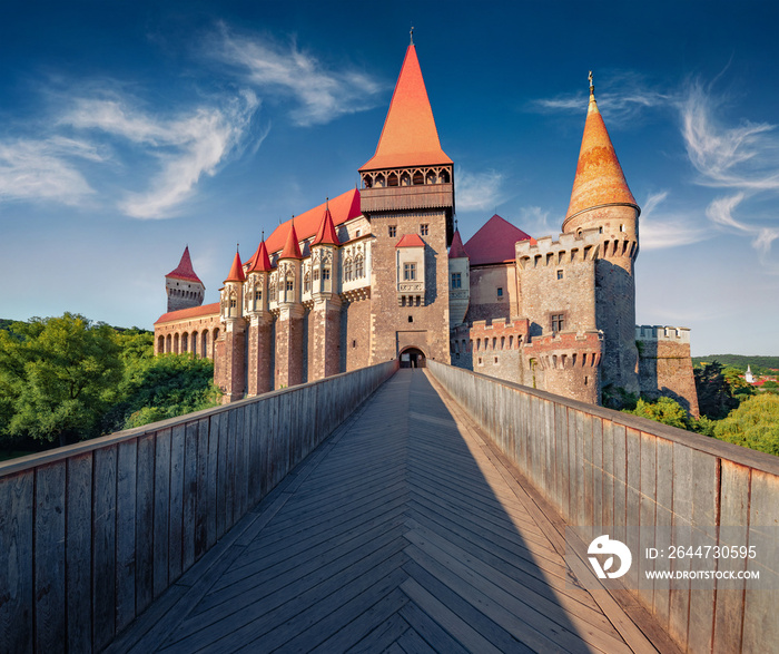 Incredible summer view of Hunyad Castle (Corvin’s Castle). Wonderful summer scene of Hunedoara, Transylvania, Romania. Romanian castle landmarks.