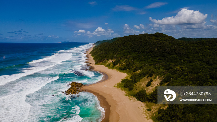 St Lucia South Africa, Rocks sand ocean, and blue coastal skyline at Mission Rocks beach near Cape Vidal in Isimangaliso Wetland Park in Zululand. South Africa St Lucia