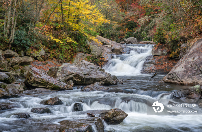 Morning Autumn view of Cullasaja Bust Your Bull Falls on US Highway 64,  Mountain Waters Scenic Highway & Waterfall Byway near Highlands, North Carolina - Nantahala National Forest