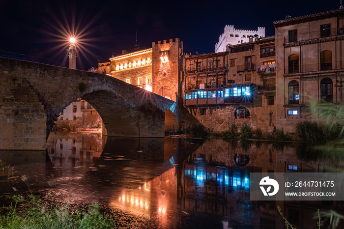 Night photography of the medieval bridge of Valderrobres at night, Matarraña, Teruel, Spain