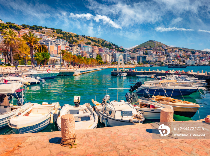 Wonderful spring cityscape of Saranda port. Beautiful Ioninian seascape. Colorful morning scene of Albania, Europe. Traveling concept background.