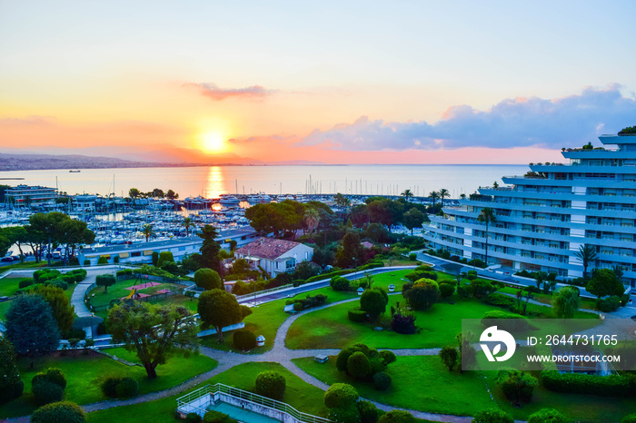 Landscape of beautiful Marina Baie des Anges on background of wonderful sunset. Villeneuve-Loubet. France.