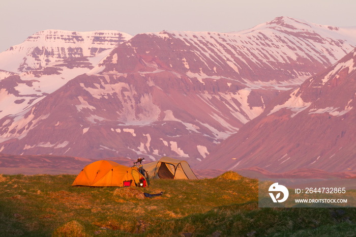 two tents in the shine of the midnight sun in iceland