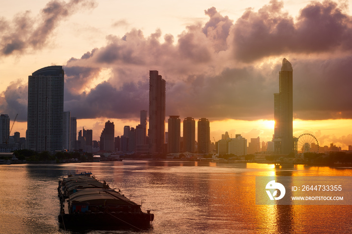 Bangkok sunrise cityscape with chao praya river and giant swing with buildings