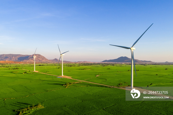 Landscape with Turbine Green Energy Electricity, Windmill for electric power production, Wind turbines generating electricity on rice field at Phan Rang, Ninh Thuan, Vietnam. Clean energy concept.