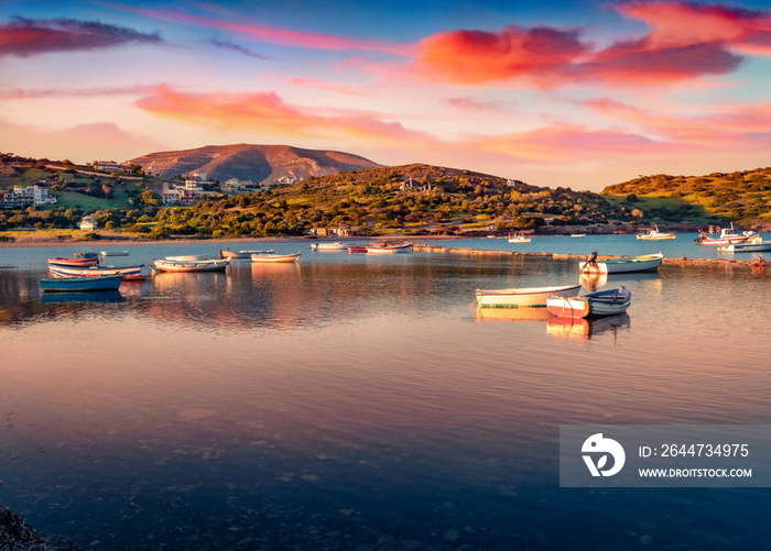 Calm summer view of Nuevo Loca Beach. Picturesque sunrise on Aegean sea. Beautiful morning scene of outskirts of Anavyssos town, Greece, Europe. Traveling concept background.