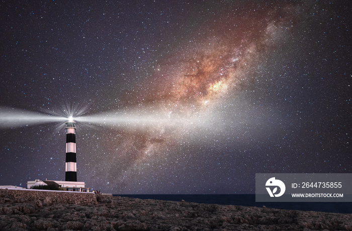 Vibrant Milky Way composite image over landscape Cap Artrutx Lighthouse on the Spanish mediterranean island of Menorca