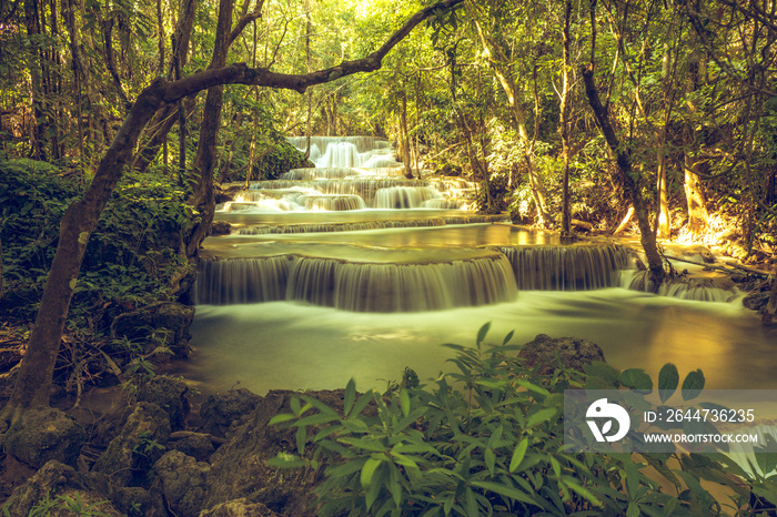 Long exposure exotic  beautiful tropical deep rainforest waterfall   Fresh turquoise waterfalls in deep forest of Huay Mae Khamin waterfall in the national park Beautiful landscape waterfalls