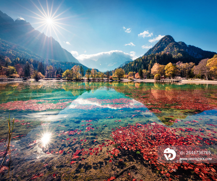 Gorgeous morning view of Jasna lake. Stunning autumn scene of Julian Alps, Gozd Martuljek location, Slovenia, Europe. Wonderful landscape of Triglav National Park. Traveling concept background.