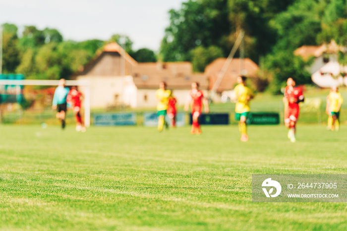 Blurred background with soccer players training