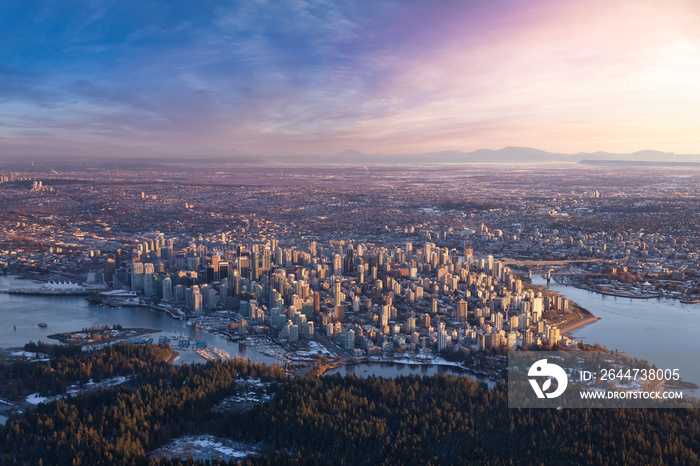 Aerial view of Stanley Park and Downtown Vancouver, BC, Canada. Dramatic Colorful Sunset Sky Art Render.