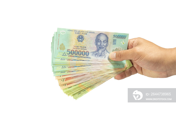 clipping path Money in Vietnam on hand (Socialist Republic Of Vietnam), Dong, VND, Pay, exchange money isolated on white background.