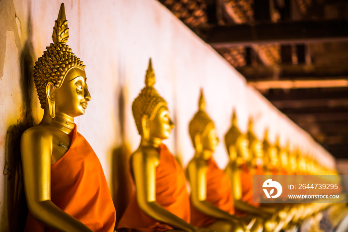 Golden Buddha is lined up at Wat Phutthaisawan, Phra Nakhon Si Ayutthaya, the worship of Buddhism in Thailand, the great archaeological site of Thailand,Is a Buddhist mind sticker.