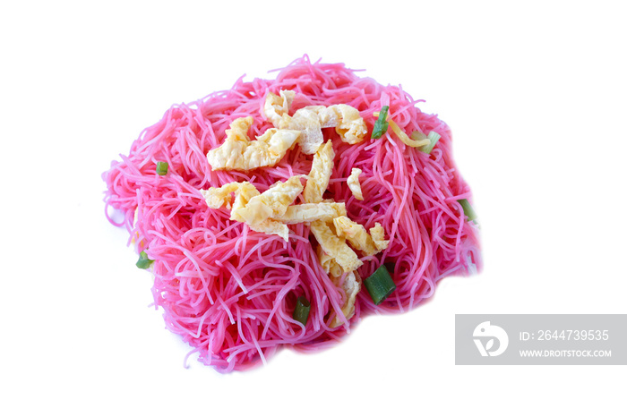 Closeup stir fried pink noodle ,topping with sliced omelet and vegetable, isolated on white background. concept : Thai traditional food. Street food in Thailand.