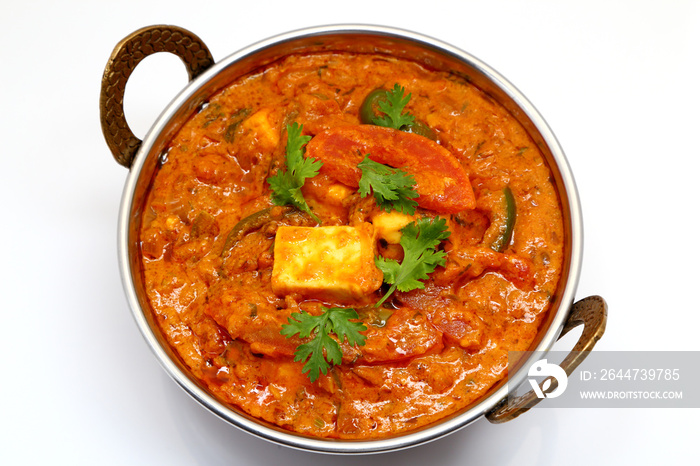 Indian Food or Indian Curry in a copper brass serving bowl.