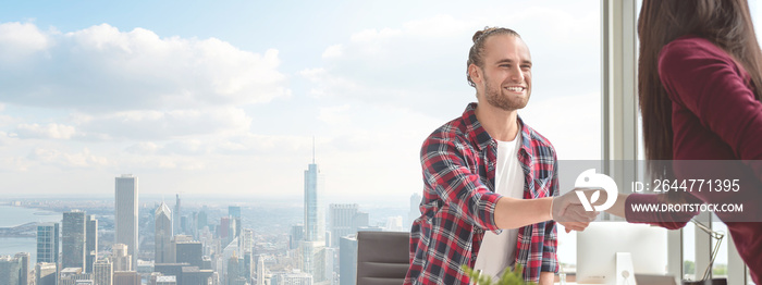 Confident young caucasian asian man shaking hands with partner woman in business agreement smiling together feeling happy. Banner of young business couple in deal, partnership and handshake concept.