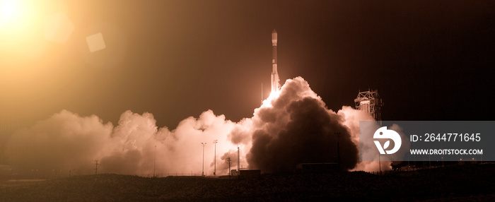 Rocket and light. The elements of this image furnished by NASA.