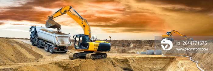 excavator is working and digging at construction site