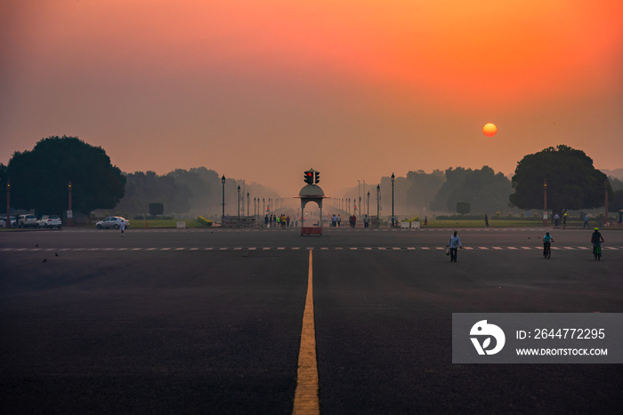 View at sunrise from rajpath ’King’s Way’ is a ceremonial boulevard in New Delhi, India that runs from Rashtrapati Bhavan on Raisina Hill through Vijay Chowk and India Gate