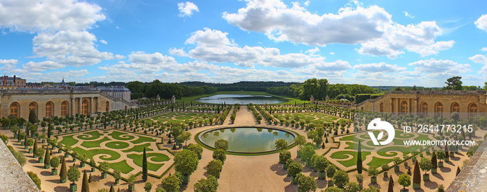 Versailles Palace exterior near Paris, France. This view shows the Orangerie with citrus fruit trees.