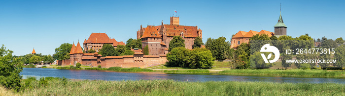 Panorama of Teutonic Castle in Malbork or Marienburg at summer in Poland