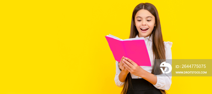 Happy girl child read school textbook yellow background, reading. Horizontal isolated poster of school girl student. Banner header portrait of schoolgirl copy space.