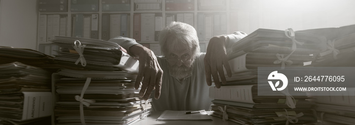 Stressed overloaded office worker